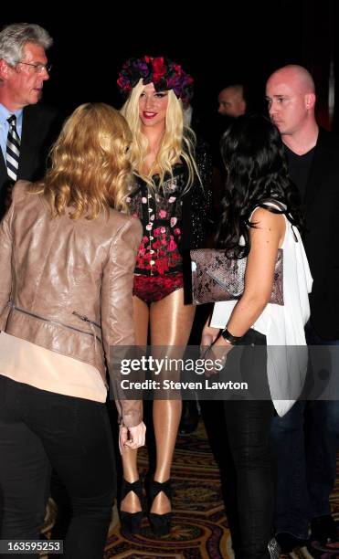 Singer/songwriter Ke$ha arrives at the Pure Nightclub at Caesars Palace to host the club's eighth anniversary party on March 12, 2013 in Las Vegas,...