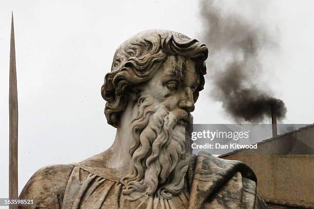 Black smoke billows from the chimney on the roof of the Sistine Chapel indicating that the College of Cardinals have failed to elect a new Pope on...