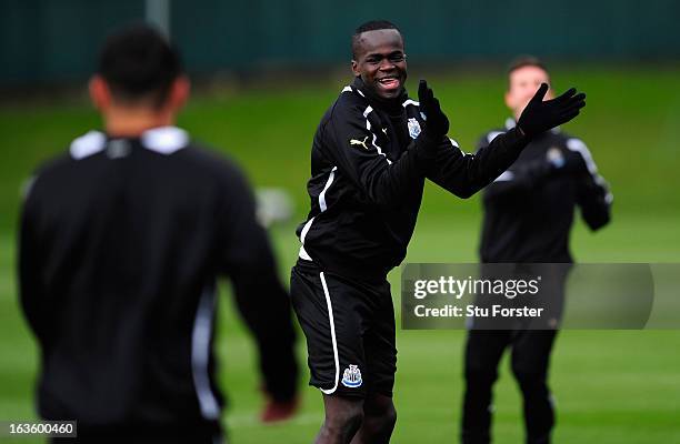 Newcastle player Cheick Tiote leads the warm up dance routine during Newcastle United training at The Little Benton training ground on March 13, 2013...