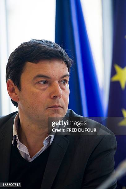 French economist Thomas Piketty attends during a meeting at the National Assembly on March 13, 2013 in Paris. AFP PHOTO / FRED DUFOUR