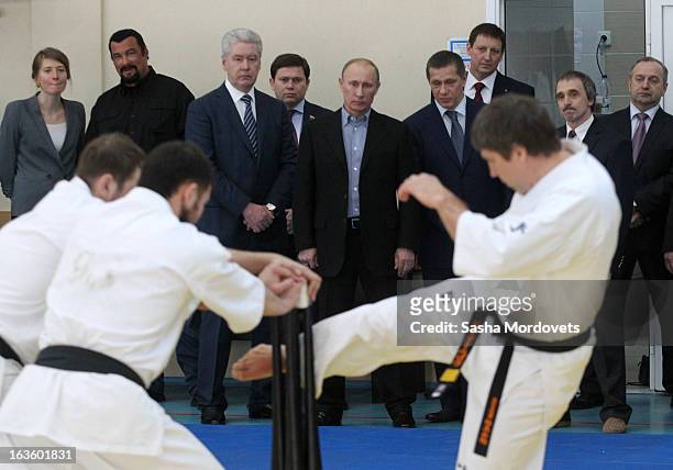 Actor Steven Seagal and Russian President Vladimir Putin are seen visiting Sambo-70, a Russian martial art and combat sport school, March 13, 2013 in...