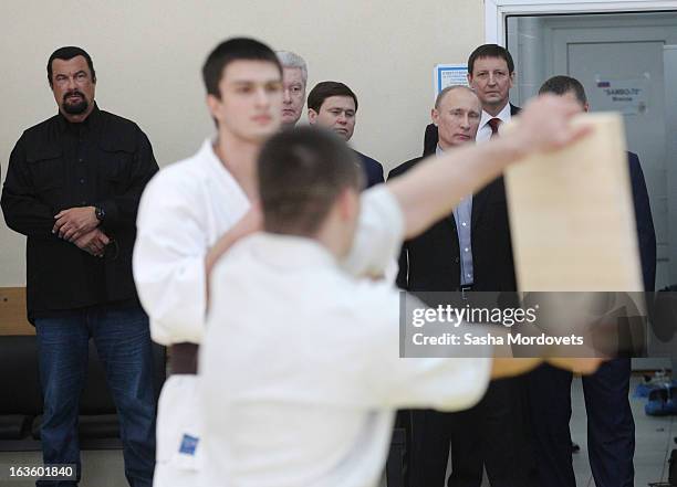 Actor Steven Seagal and Russian President Vladimir Putin are seen visiting Sambo-70, a Russian martial art and combat sport school, March 13, 2013 in...