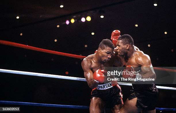 Mike Tyson throws a punch against Alfonzo Ratliff during the fight at the Hilton Hotel in Las Vegas, Nevada. Mike Tyson won by a TKO 2.