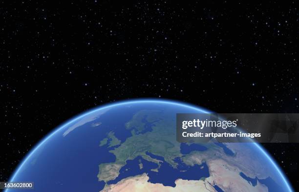 blue globe with europe against a black nightsky - map europe globe stock pictures, royalty-free photos & images