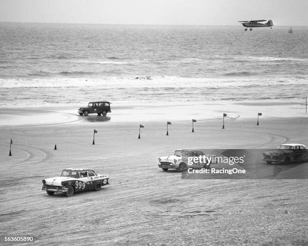 February 26, 1956: Jack Smith in a 1955 Ford leads the 1955 Buick of Tommy Thompson and Charlie Scott’s Kiekhaefer 1955 Chrysler during the NASCAR...