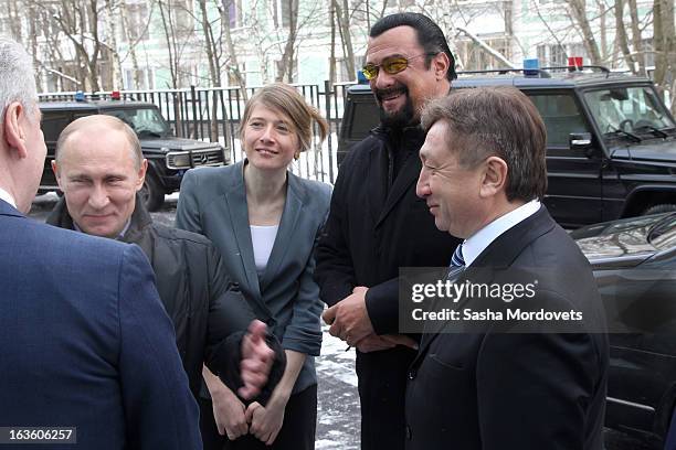 Actor Steven Seagal and Russian President Vladimir Putin visit Sambo-70, a Russian martial art and combat sport school, March 13, 2013 in Moscow,...