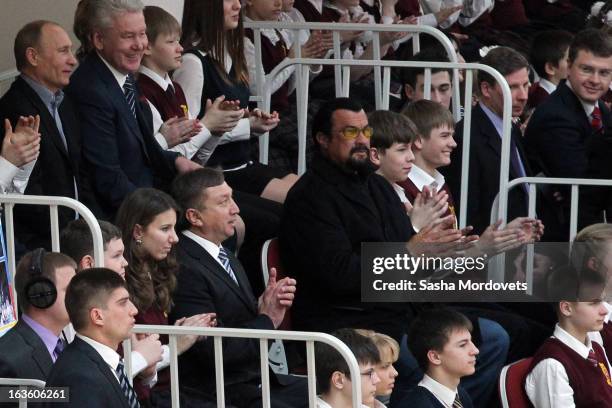 Actor Steven Seagal and Russian President Vladimir Putin visit Sambo-70, a Russian martial art and combat sport school, March 13, 2013 in Moscow,...