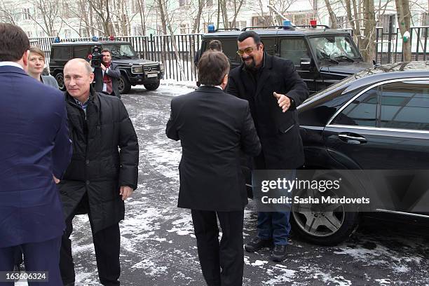 Actor Steven Seagal and Russian President Vladimir Putin visit Sambo-70, a Russian martial art and combat sport school, March 13, 2013 in Moscow,...