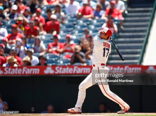Shohei Ohtani of the Los Angeles Angels hits a two-run home run against the Cincinnati Reds in the first inning during game one of a doubleheader at...