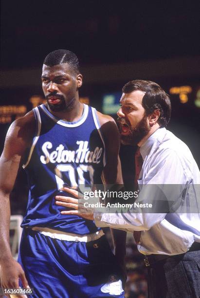 Big East Tournament: Seton Hall head coach P.J. Carlesimo with Mark Bryant on sidelines during game vs Georgetown at Madison Square Garden. New York,...