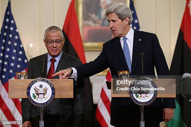 Secretary of State John Kerry and Libyan Prime Minister Ali Zeidan hold a news conference in between bilateral meetings in the Ben Franklin Room at...