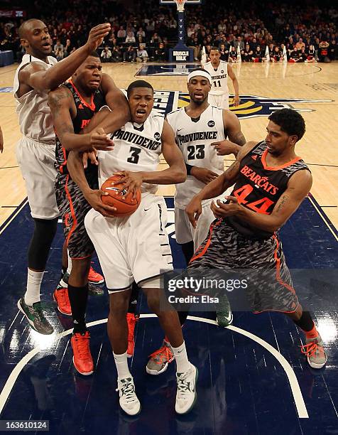 Kris Dunn of the Providence Friars fights for the rebound during the second round of the Big East Tournament at Madison Square Garden on March 13,...