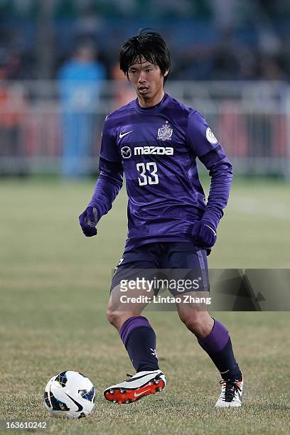 Tsukasa Shiotani of Hiroshima Sanfrecce controls the ball during the AFC Champions League Group match between Hiroshima Sanfrecce and Beijing Guoan...
