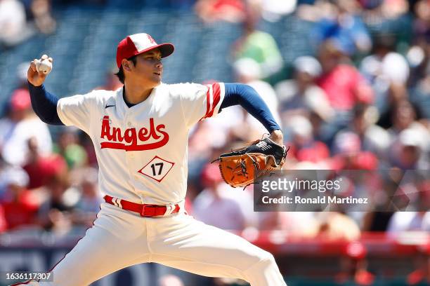 Shohei Ohtani of the Los Angeles Angels throws against the Cincinnati Reds in the second inning during game one of a doubleheader at Angel Stadium of...