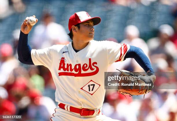 Shohei Ohtani of the Los Angeles Angels throws against the Cincinnati Reds in the second inning during game one of a doubleheader at Angel Stadium of...