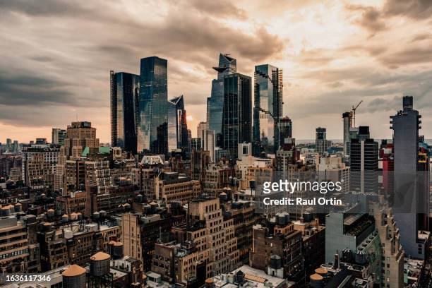 new york city skyline, downtown at sunset.nyc , usa .aerial view - new york vacation rooftop stock pictures, royalty-free photos & images