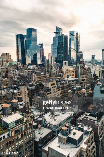 manhattan downtown skyline at sunset.new york city, usa.financial district - new york vacation rooftop stock pictures, royalty-free photos & images