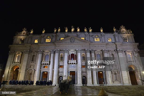 Swiss guard take place before the first appearance of the new pope on the central balcony of St Peter's basilica minutes after white smoke rose from...
