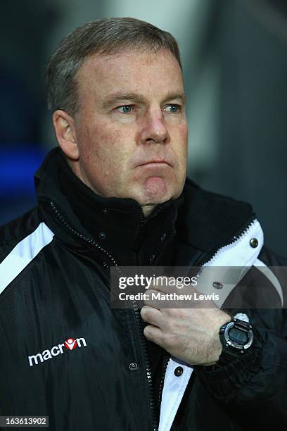 Millwall Manager Kenny Jackett looks on prior to the FA Cup sponsored by Budweiser Sixth Round Replay match between Blackburn Rovers and Millwall at...