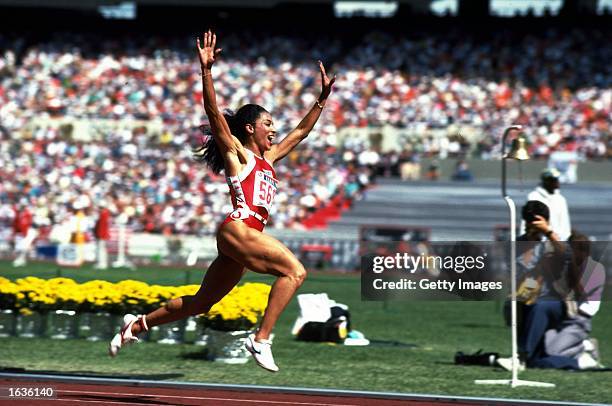 Florence Griffith Joyner of the USA celebrates her 100m win during the 1988 Olympic Games in Seoul, Korea \ Mandatory Credit: Allsport UK /Allsport