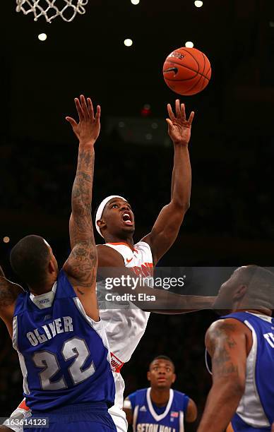 Fair of the Syracuse Orange drives to the basket against Brian Oliver of the Seton Hall Pirates in the second half during the second round of the Big...