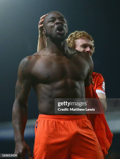 Danny Shittu of Millwall celebrates scoring the opening goal during the FA Cup sponsored by Budweiser Sixth Round Replay match between Blackburn...