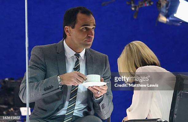 Wigan Manager Roberto Martinez watches the game from a TV studio during the FA Cup sponsored by Budweiser Sixth Round Replay match between Blackburn...