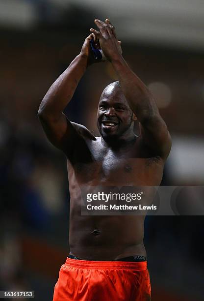Danny Shittu of Millwall celebrates victory at the end of the FA Cup sponsored by Budweiser Sixth Round Replay match between Blackburn Rovers and...