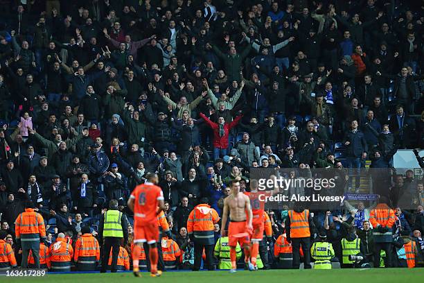 The Millwall players celebrate in front of their fans at the end of the FA Cup sponsored by Budweiser Sixth Round Replay match between Blackburn...