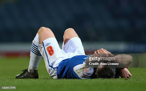 David Dunn of Blackburn Rovers shows his dejection at the end of the FA Cup sponsored by Budweiser Sixth Round Replay match between Blackburn Rovers...