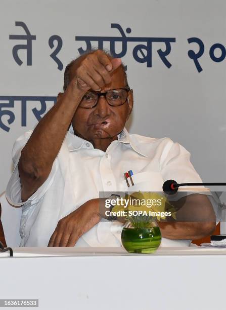Nationalist Congress Party chief Sharad Govindrao Pawar gestures with his hand during the Maha Vikas Aghadi press conference in Mumbai. The press...
