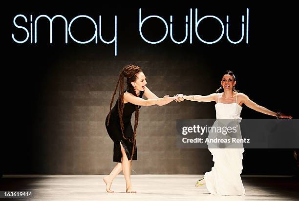 Designer Simay Bulbul and Singer Jehan Barbur on the runway at the Simay Bulbul show during Mercedes-Benz Fashion Week Istanbul Fall/Winter 2013/14...