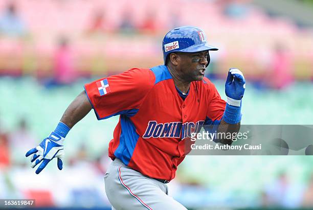 Miguel Tejada of Team Dominican Republic runs to first base during Pool C, Game 3 between Spain and the Dominican Republic in the first round of the...