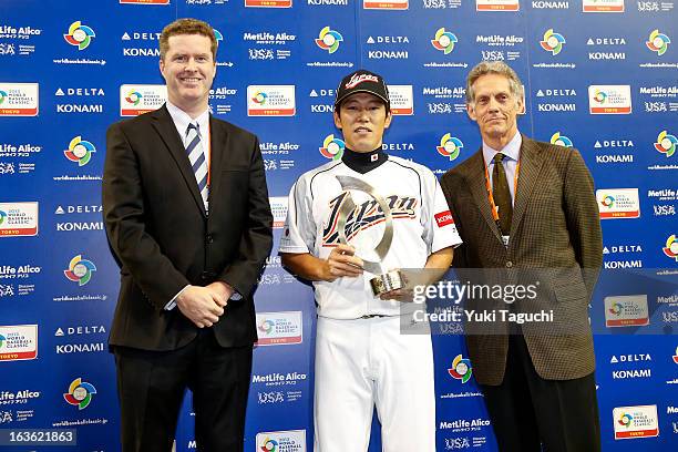 Hirokazu Ibata of Team Japan receives the MVP award after Pool 1, Game 6 between the Netherlands and Japan in the second round of the 2013 World...