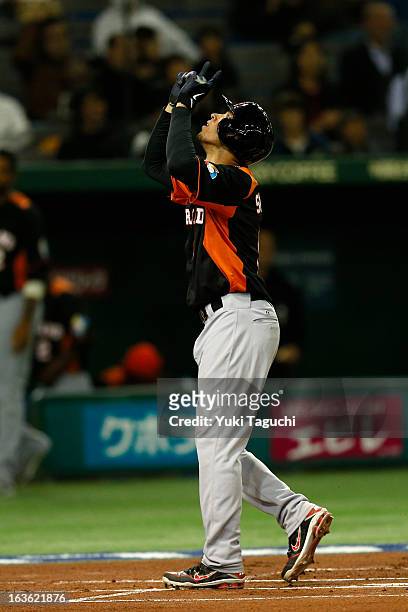 Andrelton Simmons of Team Netherlands hits a home run in the top of the first inning during Pool 1, Game 6 between the Netherlands and Japan in the...