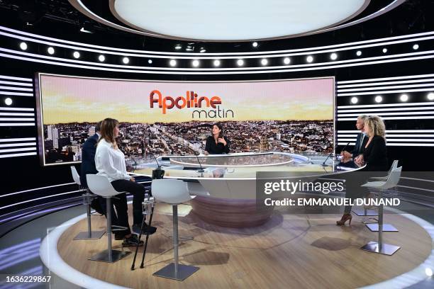 French BFM TV news channel host and journalist Apolline de Malherbe speaks during her broadcast television show "Apolline Matin" on the new BFM TV...