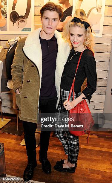 Oliver Cheshire and Pixie Lott attend the Panasonic Technics 'Shop To The Beat' Party hosted by George Lamb at French Connection, Oxford Circus, on...