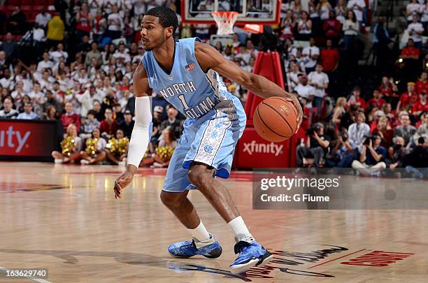 Dexter Strickland of the North Carolina Tar Heels handles the ball against the Maryland Terrapins at the Comcast Center on March 6, 2013 in College...