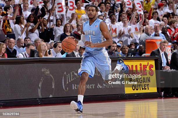 Dexter Strickland of the North Carolina Tar Heels handles the ball against the Maryland Terrapins at the Comcast Center on March 6, 2013 in College...