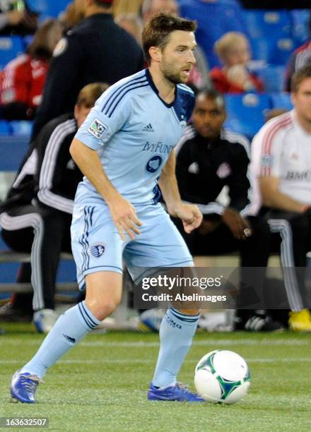 Bobby Convey of Sporting Kansas City controls the ball against Toronto FC during MLS action at the Rogers Centre March 9, 2013 in Toronto, Ontario,...