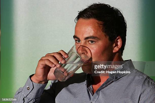 Zac Guildford takes a drink of water during a press conference at New Zealand Rugby House on March 14, 2013 in Wellington, New Zealand.