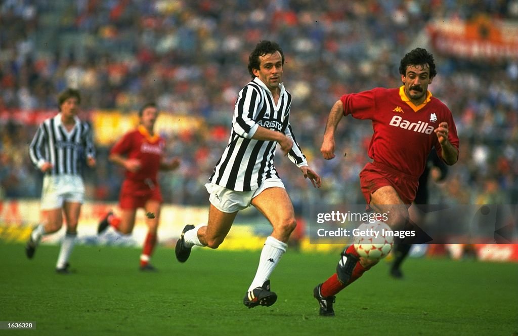 Michel Platini of Juventus and Emidio Oddi of Roma