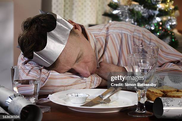 man sleeping at dining table - over eating stock pictures, royalty-free photos & images