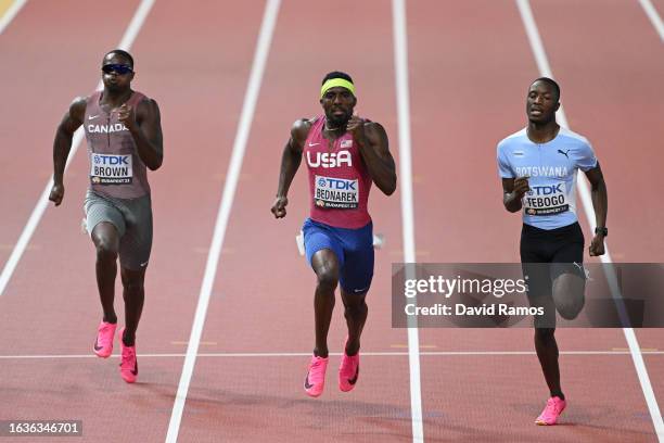 Aaron Brown of Team Canada, Kenneth Bednarek of Team United States and Letsile Tebogo of Team Botswana compete in the Men's 200m Semi-Final during...