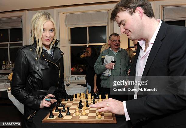 Laura Whitmore and chess grandmaster Gawain Jones attend the launch of the 'Urban Chess' Funding Initiative from East Village at Mortons on March 13,...