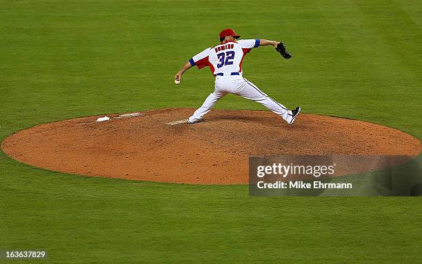 Romero of Puerto Rico pitches during a World Baseball Classic second round game against Italy at Marlins Park on March 13, 2013 in Miami, Florida.