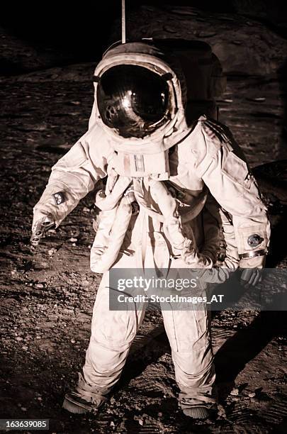 reenactment moon landing during apollo mission - astronaut moon stock pictures, royalty-free photos & images