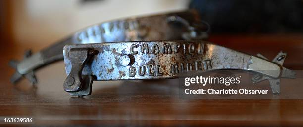 Pair of spurs Jerome Davis won in Clovis, New Mexico in 1992 is displayed at his Archdale, North Carolina home, March 6, 2013. Davis was one of the...