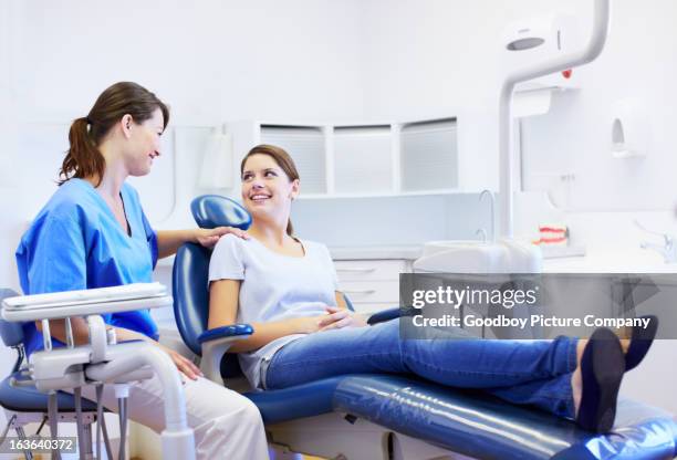 don't worry, this is all routine - dentist patient stock pictures, royalty-free photos & images