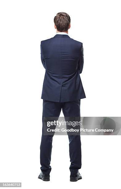 turning his back on business - man in suit stockfoto's en -beelden